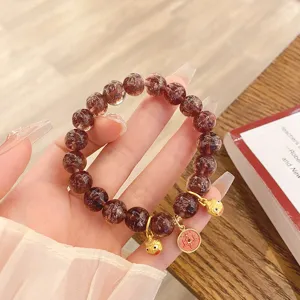 Bracciale di perle in cristallo e foglia d'oro in stile cinese con ciondoli di bestia mitica.