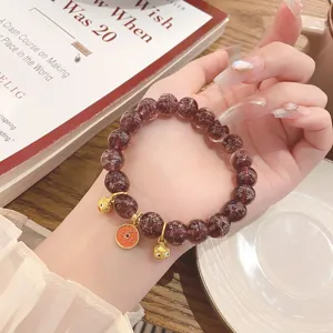 Bracciale vintage in vetro di stile cinese con foglia d'oro e ciondolo animale carino.