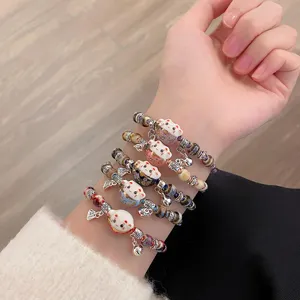 Ceramic lucky cat bracelet set, multi-layer beaded wrist charm for women and best friends.