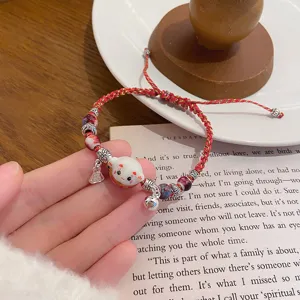 Red woven ceramic lucky cat bracelet detail view, cute bracelet for best friends gift.