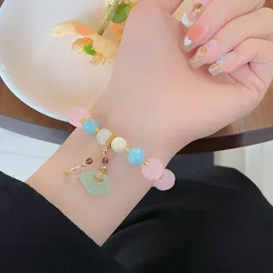 Bracelet de perles de lotus de style chinois, bijoux en cristal rose pour femmes élégantes.