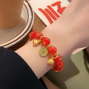 Bracciale di perle in vetro rosso dorato stile cinese con ciondoli, bellissimo gioiello.