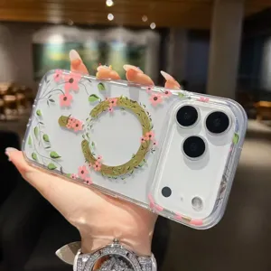 Clear IMD phone case detail, elegant pink floral vines and gold magnetic ring design.