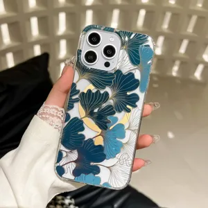 Clear IMD phone case for iPhone featuring elegant blue and gold ginkgo leaf botanical pattern.