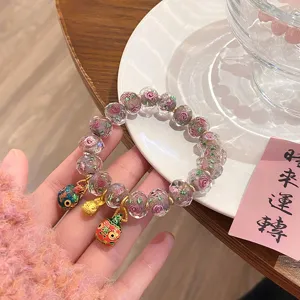 Sweet princess style faceted glass rose beaded bracelet with cute colorful enamel animal charms.