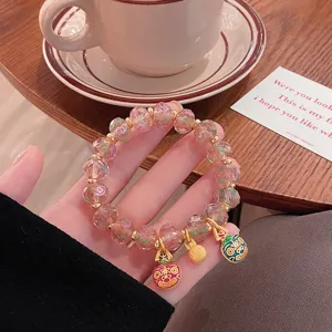 Sweet pink glass rose beaded bracelet with cute enamel charms, dainty fairy aesthetic jewelry.