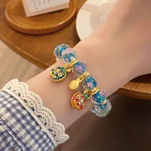 Sweet princess style glass bead bracelet featuring cute gold-tone beast charms for daily wear