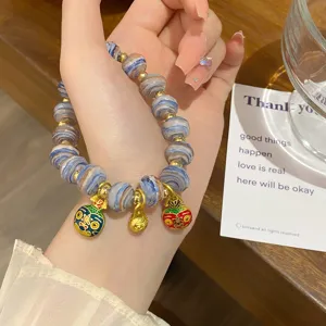 Sweet glazed bead bracelet with cute charms, fresh princess style wrist jewelry for women.