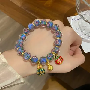 Gorgeous blue glass rose beaded bracelet with gold charms, sweet princess style jewelry gift.