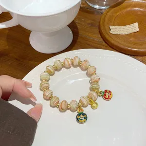 Sweet princess style multi-color glaze bead bracelet with cute animal pendants for girls.