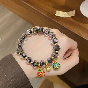 Sweet glass rose bead bracelet with cute gold charms, stylish princess style wrist jewelry.