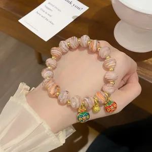 Sweet princess style colored glaze beaded bracelet with cute charms, exquisite detail shot.