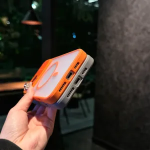 Close-up detail of magnetic phone case with dual color orange and grey design for wireless charging.