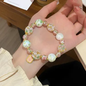 Bracelet en perles florales émaillées exquis, bijoux de style fée doux design de niche.