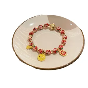 Bracelet de perles cloisonné de style chinois avec pendentifs dorés bijoux rétro principal