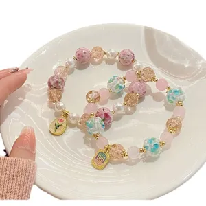 Bracelet de perles de cristal rose et boules de fleurs vernies style féerique doux pour femmes chic