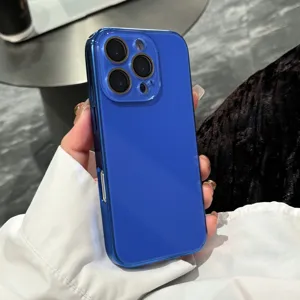 Glossy electroplated blue phone case detail, smooth glass back texture, drop-proof protection.