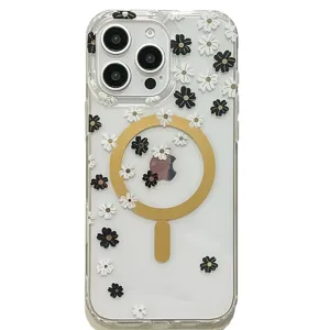 Clear MagSafe phone case for iPhone with black white daisy flowers and magnetic ring.