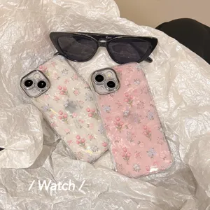 Detail view of stylish shell texture tulip floral iPhone case with camera protector and sunglasses.