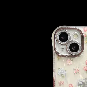 Detailed close-up shot of glossy shell texture phone case featuring tulip floral rhinestones.