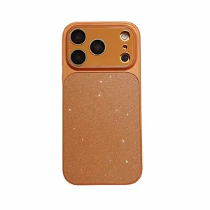 Detailed view of the luxury orange glitter phone case with large camera window protection.