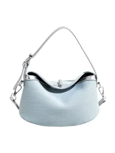 Light blue denim shoulder bag for women, stylish casual handbag with silver hardware.