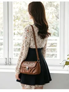 Retro women's brown shoulder crossbody bag with stylish metal studs and lock design daily use.