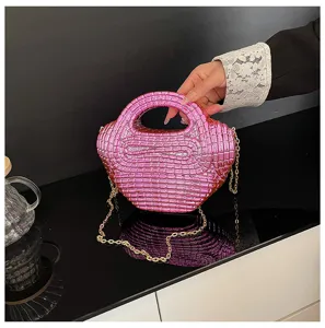 Pink acrylic dumpling bag for women, shiny surface shoulder crossbody handbag with chain.