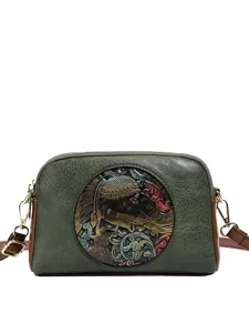 Vintage embossed leather crossbody bag for women, stylish green retro shoulder handbag.