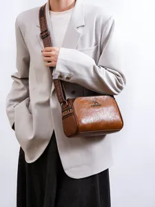 Retro vintage brown women shoulder bag stylish pillow messenger bag for daily wear detail view