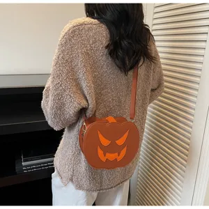 Halloween Kürbis Umhängetasche für Damen, süße kontrastfarbene kleine runde Schultertasche.