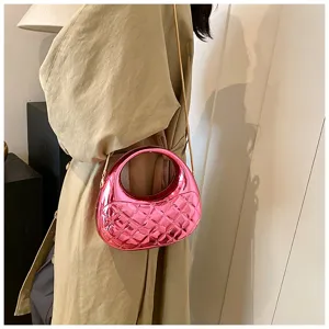 Trendy pink quilted acrylic crossbody bag with chain strap, stylish evening bag.