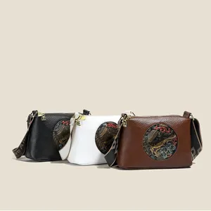 Retro ethnic style shoulder bag with embossed round pattern, chic PU leather crossbody bag.