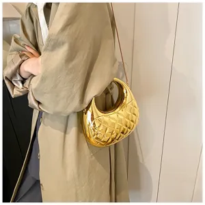 Metallic gold quilted design detail of the stylish fashion cross-body hobo handbag.