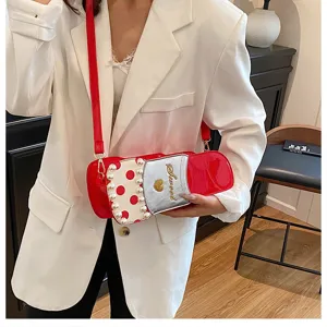 Creative lipstick-shaped crossbody bag with pearl decor, stylish red shoulder bag for women.
