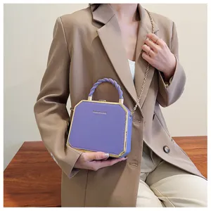 Purple box handbag with twisted handle and gold chain strap for women fashionable crossbody bag