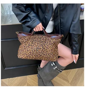 Leopard print women handbag detail view, casual tote bag with spacious interior design.