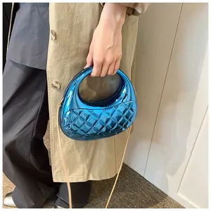 Glossy blue quilted acrylic box bag with chain strap, minimalist stylish evening crossbody.