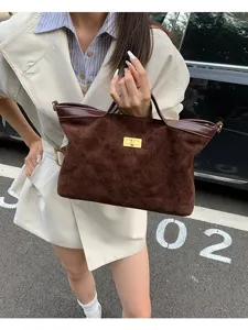 Retro large-capacity suede women's handbag with diamond quilting and gold turn-lock closure.