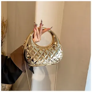 Gold metallic quilted acrylic evening bag with chain strap, chic hobo crossbody handbag.
