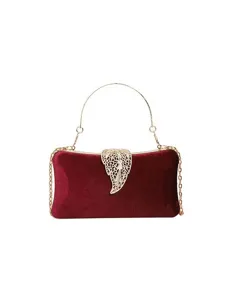 Elegant burgundy velvet evening bag with gold chain strap and hollow leaf clasp for women.