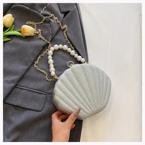 Pearl handle shell evening bag, elegant metal chain crossbody bag for women fashion party.