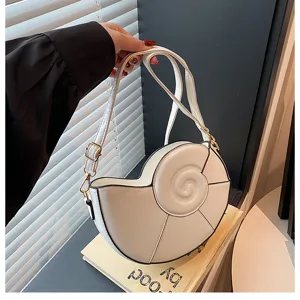 Sac à bandoulière unique en forme de coquillage pour femme, joli sac à main élégant et tendance.