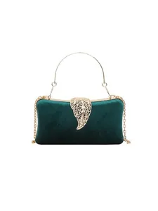 Dark green velvet evening bag with gold chain strap and elegant hollow leaf clasp for women