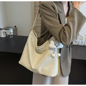 Off-white soft leather shoulder bag, casual hobo dumpling bag with cute cloud charm.
