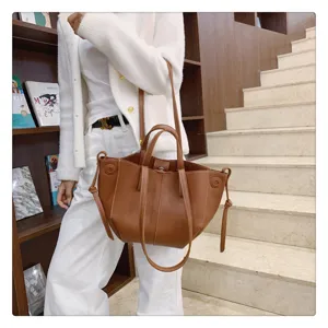Korean style fashion brown leather tote shoulder bag with top handle and stylish design.