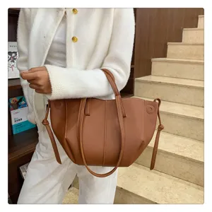 Brown leather tote bag for women, stylish pleated design shoulder handbag for daily use.