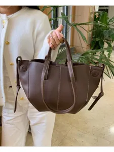 Stylish brown PU leather tote bag for women, Korean fashion pleated dumpling handbag for daily use.