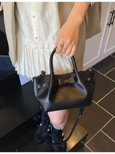 Women black leather handbag casual bow shoulder messenger bucket bag main view showcase