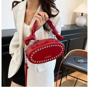 Red PU leather studded shoulder bag with knotted handle stylish crossbody bag for women
